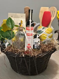 a basket filled with lots of items on top of a table