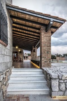 an entrance to a building with stone steps