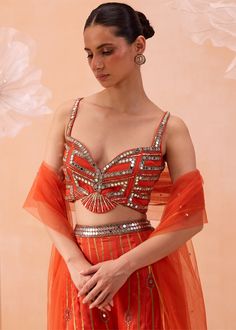 All geometric embroidered motif with mirror work highlighted with zari sequin and cutdana work paired with dupatta. Indian Wedding Outfit Bride, Orange Sharara, Mirror Maze, Candy Orange, Cutdana Work, Pre Bridal, Ethnic Dresses, Fusion Wear, Indian Wedding Outfit