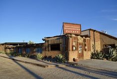 an old building in the middle of nowhere