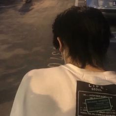 the back of a person's head with a label on it that says life is equal