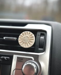 a car radio with a flower on it