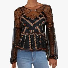 This Free People Top Is A Must-Have For Any Fashion-Forward Woman. The Black Floral Pattern And Embroidered Accents Make It Perfect For Any Occasion, Whether It's A Party Or A Casual Day Out. The Crew Neck And Long Sleeves Make It Versatile For Year-Round Wear, While The Sheer Mesh Fabric Gives It A Touch Of Bohemian Flair. It's A Regular Fit, Size Small, And Features A Button Closure. The Top Is Made Of Nylon And Is Perfect For Women Who Love Basic Styles With A Touch Of Flower-Themed Charm. It Black Festive Tops For Summer, Black Embroidered Blouse For Night Out, Embroidered Black Blouse For Night Out, Fitted Black Embroidered Top For Party, Bohemian Black Tops For Festive Occasions, Black Bohemian Top For Festive Occasions, Bohemian Black Top For Festive Occasions, Floral Embroidered Blouse For Evening In Fall, Fitted Black Embroidered Top For Fall