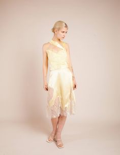 Pale yellow asymmetric silk skirt with metallic french lace Fastens with invisible zip at central backComposition: 100% Silk / Lace: 75% Lurex 25% NylonDry Clean OnlyFit and Model SizeModel wears UK size 6 and is 5'8'' (172 cm) Fits true to size, however those who are between sizes should take the larger size Light weight fabric, non stretch Designed to be fitted at waist, loose cut Silk Midi Skirt, Silk Tulle, Summer 22, Silk Lace, Silk Skirt, French Lace, Pale Yellow, Silk Top, Unique Fashion