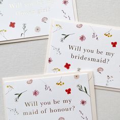 three cards with flowers on them and the words will you be my bridesmaid?