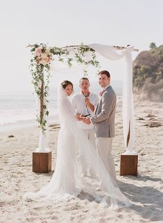 a couple getting married on the beach