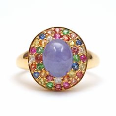 Adding some really fun affordable items to the shop for a quick pick-me-up or holiday present. This piece is super colorful with a lovely purple hazy tanzanite cabochon surrounded by a rainbow of tourmalines. Ring face measures approx. 15m x 14mm. Ring size 7.25. Setting is gold vermeil (gold over sterling silver). Multicolor Cabochon Gemstones Fine Jewelry, Multicolor Cabochon Gemstones For Fine Jewelry, Fine Jewelry Multicolor Cabochon Gemstones, Multicolor Sapphire Gemstone Ring, Multicolor Sapphire Ring, Purple Multi-stone Sapphire Ring, Multicolor Oval Sapphire Ring, Multicolor Round Sapphire Gemstones, Multicolor Oval Amethyst Ring