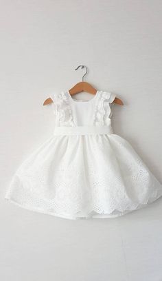 "Embroidery cotton dress - 2 layers  - sleevesless  - zip  - belt Fabric: light cotton 100% Children size chart Size: 68-74cm, 27-29 inch, Age 6-9 months Waist 17.3 inch, 44cm Size: 74-80cm, 29-31.5 inch., Age 9-12 months Waist 18.1 inch, 46cm  Size: 80-86cm, 31.5-33.8 inch., Age 12-18 months Waist 19.0 inch, 48cm  Size: 86-92 cm, 33.8-36.2 inch, Age 18-24 months Waist 19.3 inch, 49cm Age 2Y, US Size 24m, EU Size 92 Bust/Waist/Hips 55cm/52,5 cm/ 56cm 21,6\"/ 20,6\"/ 22\" Age 3Y, US Size 2T, EU Size 98 Bust/Waist/Hips 56cm/53,5 cm/ 58 cm 22\"/ 21.0\"/ 22,8\" Age 4Y, US Size 4T, EU Size 104 Bust/Waist/Hips 57cm/54,5 cm/ 60 cm 22,4\"/ 21.4\"/ 23,6\" Age 5Y, US Size 5, EU Size 110 Bust/Waist/Hips 58cm/55,5 cm/ 62 cm 22.8\"/ 21.8\"/ 24.4\" Age 6Y, US Size 6, EU Size 116 Bust/Waist/Hips 59cm/56, White Sleeveless First Communion Dress For Summer, White Sleeveless First Communion Dress With Ruffles, White Sleeveless First Communion Dress, Elegant White First Communion Dress For Summer, Elegant White First Communion Summer Dress, Sleeveless First Communion Dress For Spring, White Sleeveless First Communion Dress With Lace Trim, White Sleeveless Dress For First Communion, Cotton Dresses For First Communion In Spring