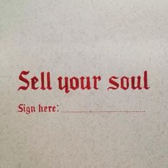 a close up of a piece of paper with writing on it that says sell your soul, sign here