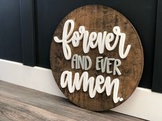 a wooden sign that says, forever and ever amen on the side of a door