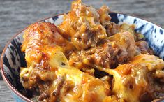 a close up of a bowl of food with the words crock pot