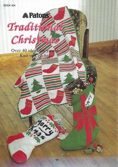 an old fashioned christmas stocking is on the floor next to some stockings and socks