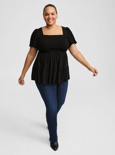 FIT Model is 5'10” wearing size 1. Measures 30” from shoulder (size 2). MATERIALS + CARE Washable Gauze woven fabric: The lightweight, breathably soft fabric you love is, at last, wash, wear and go! . Stretch level: None. 74% rayon, 26% polyester. Machine wash cold. Tumble dry low. Imported. DETAILS Square neckline. . Short sleeves. Smocked bust. . Tiered detail. . . The best plus size women's babydoll washable gauze smocked tiered top & empire waist tops in deep black made of washgauze. Torrid is your destination for cozy fall and winter clothes to keep you warm and comfortable. These babydoll & empire waist tops can be great for pregnant women looking for plus size maternity clothes that will fit with your baby bump and your belly throughout your pregnancy. Black Smocked Back Stretch Top, Black Stretch Smocked Top, Black Stretch Smocked Top Casual, Casual Black Smocked Stretch Top, Black Cotton Smocked Back Top, Black Cotton Smocked Top, Stretch Cotton Smocked Top For Fall, Cotton Stretch Smocked Top For Fall, Fitted Black Smocked Cotton Top