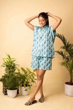 Hand Stitched  Shorts and Shirt  night dress  made with Light weight Cotton Fabric sourced from Jaipur with Block print designs. The Apparels are designed by  two women entrepreneurs  who believe that that all women were created infinitely beautiful and they with their  versatile creations sprinkle a little Star dust.  These light weight cotton  Pajama sets are  lounging must haves giving  you a warm ,cosy and comfortable feel. Sizes- Inches   XS Bust                41 Length           25 Waist Vacation Cotton Floral Print Sets, Cotton Floral Print Vacation Sets, Floral Print Cotton Beach Sets, Printed Relaxed Fit Sets For Daywear, Relaxed Fit Floral Print Sets For Vacation, Floral Print Sets With Relaxed Fit For Vacation, Vacation Floral Print Sets With Relaxed Fit, Vacation Sets With Floral Print And Relaxed Fit, Blue Floral Print Sets With Relaxed Fit