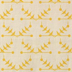 a yellow and white pattern on fabric with small circles in the middle, which are connected by lines