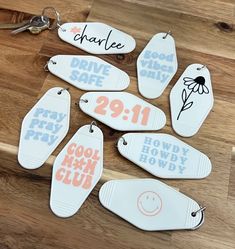 six key tags with different sayings on them