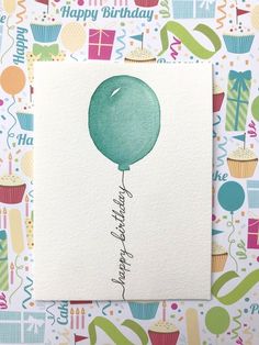 a birthday card with a green balloon on it