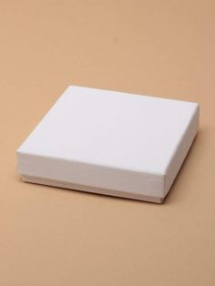 a white box sitting on top of a table