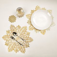 PRICES MAY VARY. 6 pcs placemats and 6 pcs coasters in the shape of the beautiful snowflakes. Perfect for creating winter festival season decoration style Made of high-quality material for heavy-duty, easy-care, and durable. Protects the tabletop surface and reduces noise from plates and cutlery Placemats measure 15” ​(38cm) in diameter. A wonderful finishing touch to your Christmas holiday dining tables, or as a decorative centerpiece anywhere you like The package comes with 6 pcs matching snow Festival Table Decorations, Snowflake Placemats, Festival Table, Winter Festival, Placemats, Table Decorations, Festival, Vinyl, Christmas