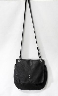 "A great shoulder bag in glam rock / vintage style, made of a luxurious version of Alcantara suede - a thick fabric with excellent usability parameters - resistant to dirt and abrasion. This suede is \"aged\", in places shimmering, black dappled. The inside of the bag also with Alcantara. The whole is closed on the zipper. The whole purse is stiffened and strengthened with the insulation - keeps the cut without filling. The belt is 3cm wide, adjustable. The bag will accommodate all necessary fem Alternative Leather Bags With Adjustable Strap, Alternative Style Satchel Shoulder Bag For Everyday Use, Grunge Rectangular Shoulder Bag For Everyday Use, Alternative Leather Bag With Adjustable Strap, Gothic Style Satchel For Everyday Use, Gothic Satchel For Everyday Use, Edgy Black Shoulder Bag With Removable Pouch, Black Grunge Bag With Adjustable Strap, Gothic Satchel Shoulder Bag For Everyday Use