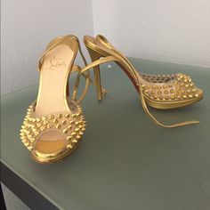 Christian Louboutin St. Jeannette Gold Spiked Heels. Preloved, Worn One Time By Christina Aguilera On Tour Given As Gift. Missing 1 Spike On The Inside So Not As Obvious. Picture Shown. Scuffs On Heels Also Shown In Picture. 100% Authentic. No Box. Designer Spiked Open-toe Heels, Gold Open Toe Heels With Red Sole, Designer Spiked High Heels, Gold Heels With Red Sole And Round Toe, Formal Pointed Toe Heels With Gold Studs, Designer Spiked Heels For Party, Gold Heels With Red Sole For Party, Designer Party Heels With Spikes, Formal Spiked Open Heel Shoes