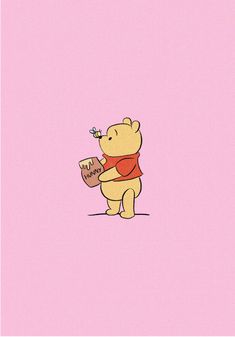 winnie the pooh holding a piece of cake