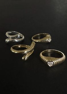 A unique and contemporary modern heirloom—Willow wraps effortlessly around your finger. Available in silver and gold, wear this ring alone or pair with diamonds. 14k solid gold—always Hollow Silver weight: 2.8g Band width: 8mm (front) x 2.7mm (back) This piece cannot be resized This piece is made to order. Please allow at least 4-6 weeks for production. Gold Sterling Silver Ring With Single Diamond, Gold Sterling Silver Stackable Ring With Diamond, 14k Gold Rings With Tension Setting And Modern Twist, Gold Stackable Rings With Single Diamond In Sterling Silver, Modern Twist Sterling Silver Stackable Rings In Yellow Gold, Gold Sterling Silver Rings With A Modern Twist, Modern Twist Stackable Rings In Yellow Gold, Silver 14k Gold Stackable Rings, Modern Twist White Gold Ring With Single Diamond