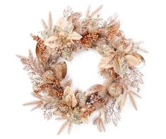 a wreath made with dried flowers and feathers