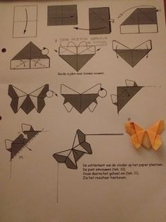 an origami butterfly is shown on top of a piece of paper with instructions to make it