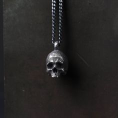 Men's Necklace Skull Pendant no Jaw Handmade in Sterling Silver History, mysticism, travel and spirituality are my main sources of inspiration and I love how skulls and bones can evoke all of these in such a mysterious way, instilling in them a notion of protection. I believe jewelry can stimulate a contemplative and inquisitive approach to life and open one's mind to beauty and subjectivity. By creating these pieces, I aim to transform the spectacle of nature into eternal timeless jewels. Size Skulls And Bones, Mens Sterling Silver Necklace, Arrowhead Necklace, Skull Necklace, Skull Pendant, Square Pendant, Silver Prices, Mens Pendant, Men's Necklace