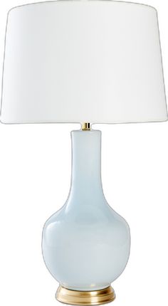 a white table lamp with a gold base and a light blue shade on the top