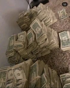 a pile of money sitting on the floor