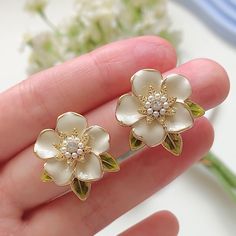 🍀 Size: 2x2.3cm 🍀 Material: 14K Gold Plated Sterling Silver Stud, Brass, Zircon, Resin (✨Hypoallergenic Stud✨) Description 🌸 These extremely intricate and delicate gardenia floral earrings are simply stunning for your special day or any day! The design features elegant white flowers with faux pearl and zircon accents, creating a truly unique and romantic statement accessory that is perfect for brides, bridesmaids, or any dress. 🌸 ⭐️ Shop more styles at https://etsy.com/uk/shop/StrawberryAtol Gold Drop Earrings With 3d Flowers, Flower Shaped Clip-on Earrings For Anniversary, White Flower Shape Jewelry For Anniversary, 3d Flower Earrings For Anniversary, Gold Jewelry With 3d Flowers For Jewelry Making, Flower-shaped Anniversary Earrings, White Flower-shaped Anniversary Jewelry, Gold Bridal Earrings With Flower Decoration, Pearl White Flower Charm Jewelry