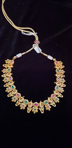 Handmade Indian Temple Jewelry, best to wear it for traditional ceremonies or Indian wedding. This bridal jewelry has ethnic finish. It has Cubic Zircon stones with ruby and emeralds. It is a Bollywood style one gram jewelry. There are long and short patterns of Indian jewelry in Kundan, Pearls, CZ, American Diamond , ruby, emerald, Polki, kemp to suit every occasion of South Indian and North Indian weddings.  Handmade Indian Jewelry item* Stunning Hand made  Traditional jewelry set.* Necklace i Kundan Temple Necklace With Zari Work, Temple Jewelry Bridal Necklace With Zari Work For Diwali, 22k Gold Chandbali Bridal Necklace With Pallu, 22k Gold Chandbali Bridal Necklace In Temple Jewelry Style, 22k Gold Meenakari Bridal Necklace In Temple Jewelry Style, Diwali Temple Jewelry Bridal Necklace In Gold Plated, 22k Gold Bridal Necklace With Zari Work For Diwali, Diwali Temple Jewelry Bridal Sets With Zari Work, 22k Gold Meenakari Bridal Necklace For Wedding