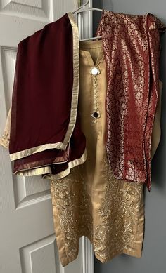 Party wear in gold and embroidery with gold in kurta with mirror buttons in neckline. The pants are silk maroon jamawar with golden patti maroon chiffon dupatta. Party Kleidung, Chiffon Dupatta, Suit Designs, Embroidered Shirt, Dress Clothes For Women, Party Wear, Favorite Outfit, Dress Outfits, Chiffon