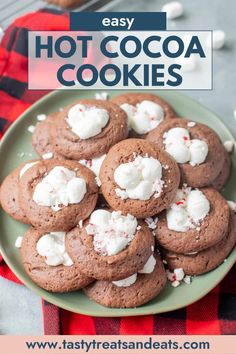 chocolate cookies with marshmallows on top and the title overlay reads easy hot cocoa cookies