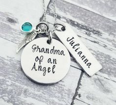 This necklace is a special keepsake for a Grandmother who has experienced the loss of a grandchild. I have hand stamped, one letter, one hammer strike at a time, "Grandma of an Angel" onto a hypoallergenic aluminum disc and added an angel wing charm, a swarovski birthstone crystal, and a personalized name tag. The   round 1" pendant is made of lightweight hypoallergenic grade aluminum that will not tarnish. The charms adorn a dainty sterling silver plated chain with a lobster clasp. **Upon order Keepsake Pendant Necklace With Name, Personalized Spiritual Necklaces For Keepsake, Silver Name Necklace For Keepsake, Personalized Sterling Silver Charm Necklace For Memorial, Personalized Memorial Necklaces For Mother's Day, Personalized Pendant Necklace For Keepsake, Personalized Silver Charm Necklace For Memorial, Personalized Pendant Charm Necklace For Memorial, Spiritual Personalized Charm Necklace For Keepsake