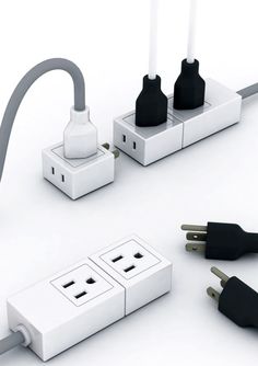 an electrical outlet with three plugs connected to it