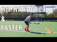 a man is playing field hockey on an outdoor court with the words hit harder and faster