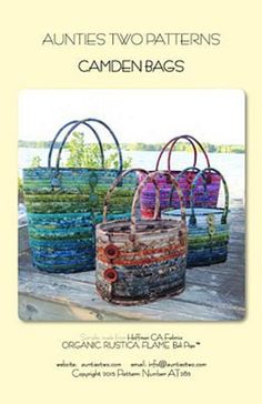 three baskets sitting next to each other on the ground