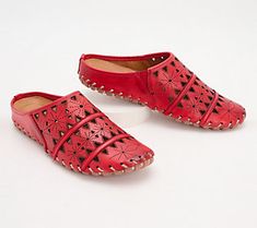 A geometric cutout design gives these leather mules a light and airy feel with breathable comfort for your feet. From Spring Step. Summer Leather Slip-ons With Perforations, Leather Slip-ons With Perforations For Summer, Red Mules With Rubber Sole For Spring, Summer Closed Toe Slip-ons With Perforations, Slip-on Perforated Sandals For Spring, Perforated Slip-on Sandals For Spring, Spring Slip-on Sandals With Perforations, Casual Perforated Sandals For Spring, Summer Slip-on Flats With Perforations