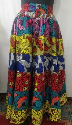 African Print Button Down Maxi Skirt Colors: Black/White, Blue/Gold, Geometric, Orange/Multi, Multi, Pink/Blue, Red/Yellow, Yellow/Orange Size: One size fit All (up to size 3X) GROUP ORDERS AVAILABLE Multicolor Patchwork Midi Skirt, Fitted Multicolor Casual Maxi Skirt, Fitted Casual Multicolor Maxi Skirt, Casual Fitted Multicolor Maxi Skirt, Multicolor Floral Print Long Skirt, Casual Multicolor Patterned Skirt, Spring Multicolor Bottoms With Buttons, Casual Multicolor Flared Maxi Skirt, Relaxed Multicolor Patchwork Skirt