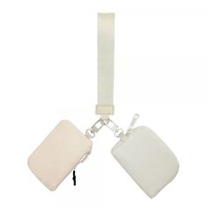 New Cream / Ivory Two Pouch Wristlet. Removable Pouches. Water Resistant. Approx 4” L X 3” T Strap 8” L Travel-friendly Beige Coin Purse With Interior Key Chain Holder, Cream Rectangular Coin Purse For Everyday Use, Beige Rectangular Wristlet For Travel, Beige Coin Purse With Removable Pouch For Daily Use, Beige Pouch Coin Purse For Everyday Use, Everyday Beige Zipper Coin Purse, Cream Rectangular Pouch For Everyday, Cream Rectangular Pouch For Everyday Use, Everyday Cream Rectangular Pouch