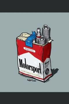 a can of motor sport sitting on top of a table