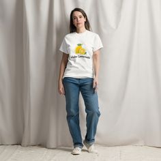 This fun graphic t-shirt with the saying, "Make Lemonade" is a nod to the saying "when life gives you lemons, make lemonade"...simple, bright and printed on a Men's Shirt so it will be OVERSIZED for women and fit accordingly for men.   Personally I have this, as a woman, in a Medium, I am 5'2, 150lbs and I can wear with leggings or biker shorts and love it! The 100% cotton men's classic tee will help you land a more structured look. It sits nicely, maintains sharp lines around the edges, and goe Funny White Relaxed Fit T-shirt, Funny Relaxed Fit White T-shirt, Funny White Print Short Sleeve T-shirt, Funny Relaxed Fit Crew Neck T-shirt, White T-shirt With Funny Print In Short Sleeve, Funny Pre-shrunk Everyday T-shirt, Funny Relaxed Fit Pre-shrunk T-shirt, Summer Relaxed Fit Ring-spun Cotton T-shirt, Funny Graphic Print T-shirt For Everyday