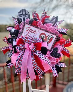 a valentine's day wreath on top of a chair