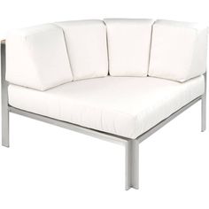 a white couch sitting on top of a metal frame