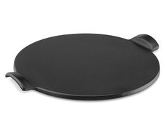 an empty black plate with handles on a white background for use as a serving platter