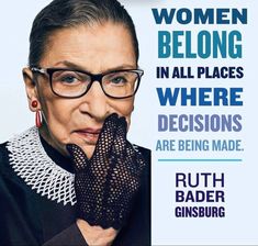 an older woman wearing glasses and holding her hands to her face with the words women belong in all places where decision are being made