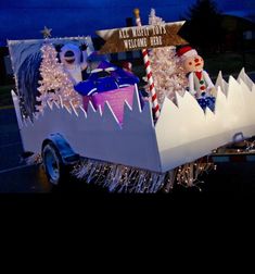 a car decorated with christmas decorations and lights